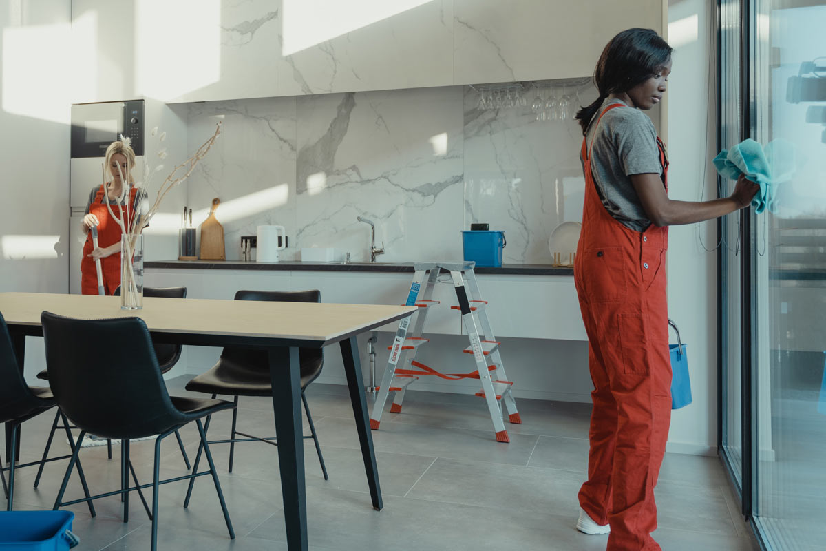 Girls cleaning a house
